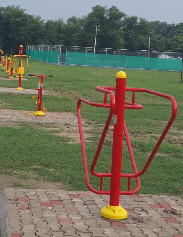 Outdoor fitness equipment installed on open ground